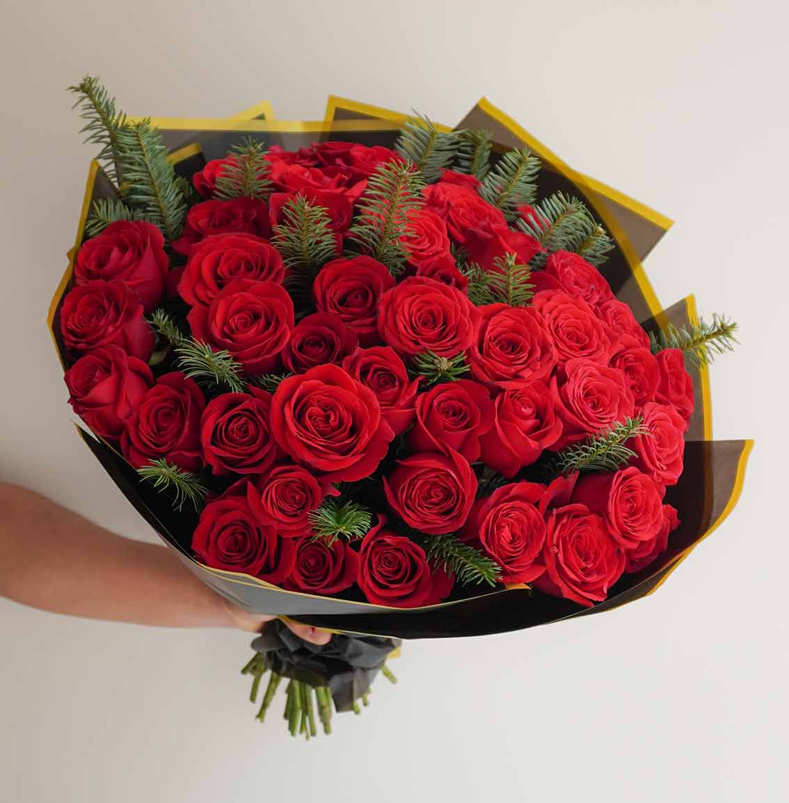 envia ramo de flores rosas rojas navideño