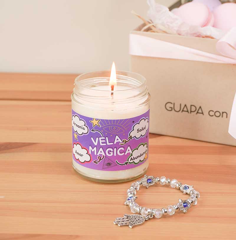 regalos con flores y vela de la fortuna