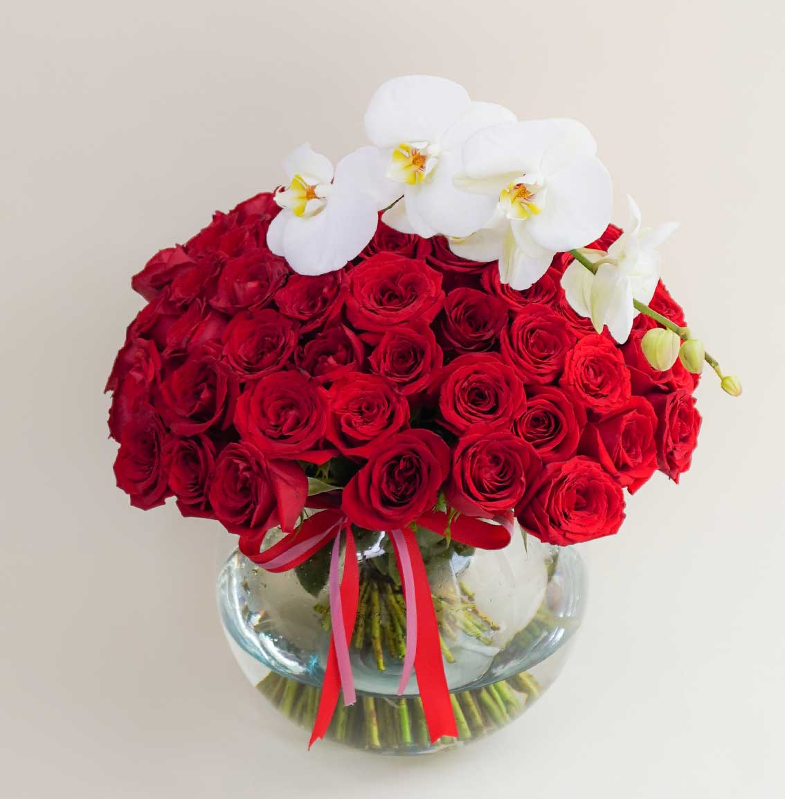 arreglo de 100 rosas rojas con orquídeas en cdmx
