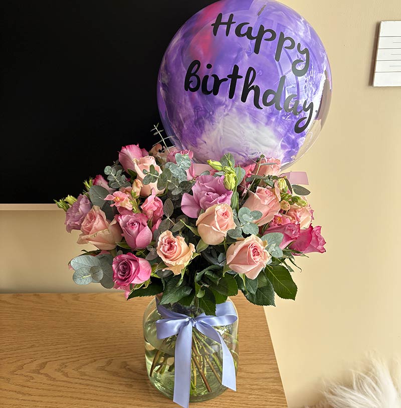 arreglo de rosas con globo