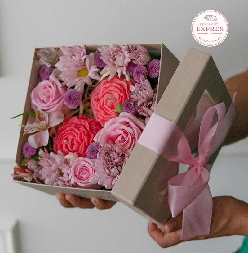 caja de flores con velas expres