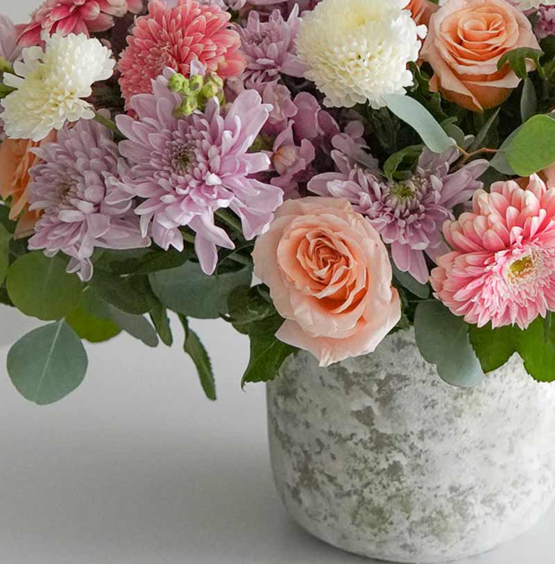 envia arreglo de flores con gerberas y rosas