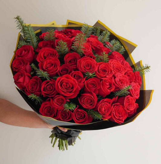 envia ramo de flores rosas rojas navideño