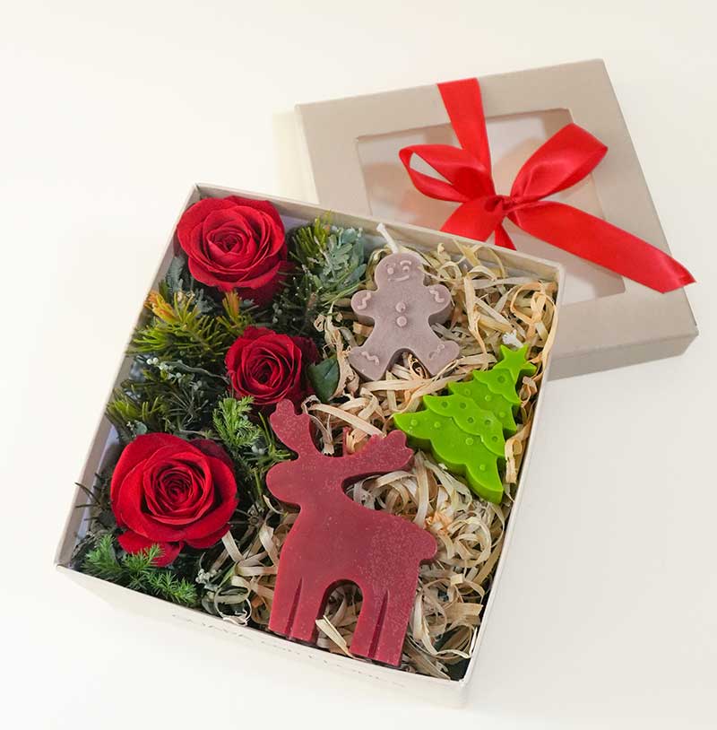 regalo de flores y velas para navidad